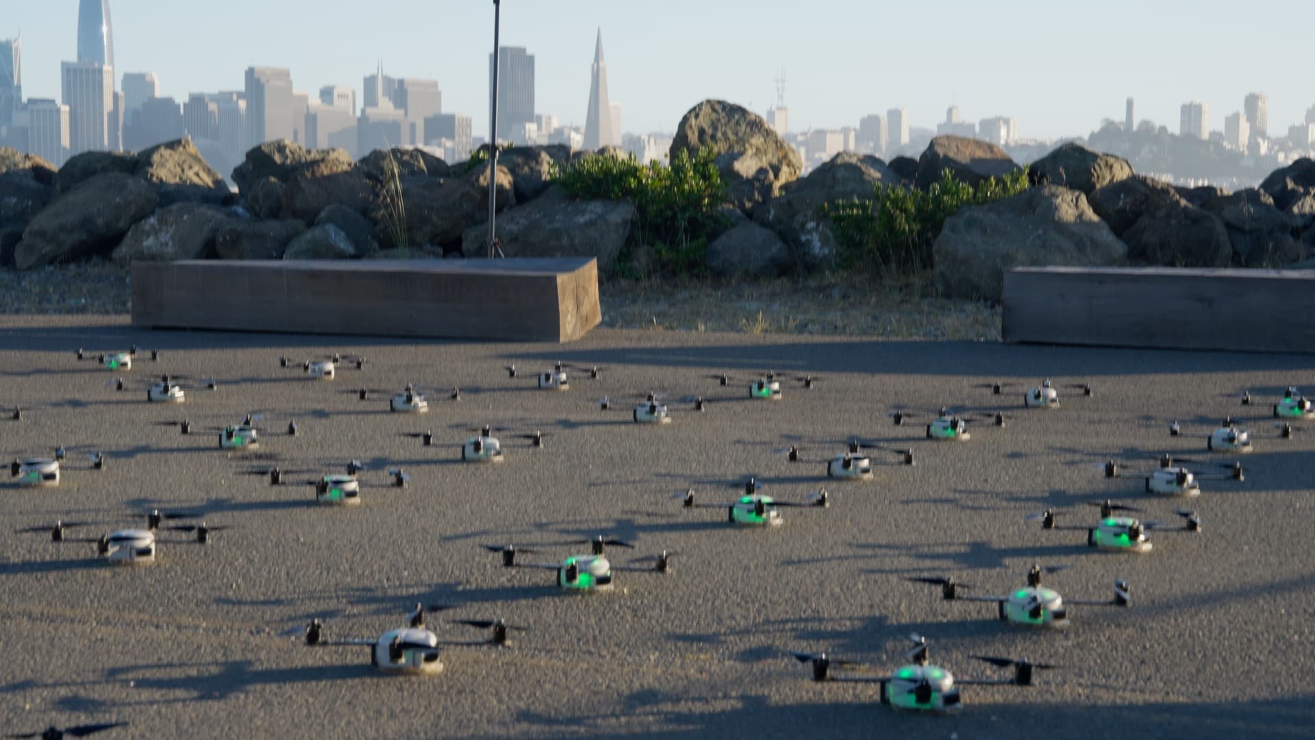 Fleet staged on the tarmac with the San Francisco skyline behind